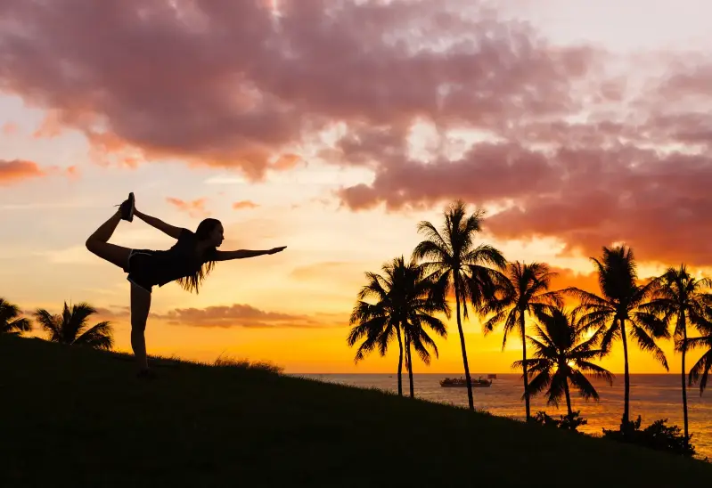 Woman doing yoga The Ohana Hawaii The Ohana Hawaii